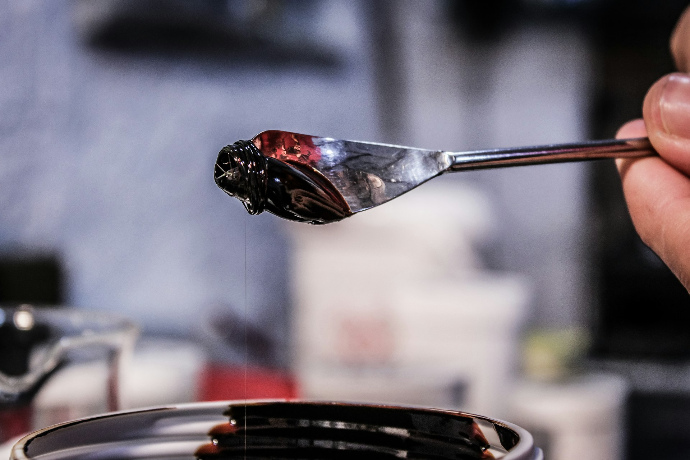 stainless steel fork on black round plate